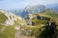 Picteresque view of a high cliff, rocks, green hillsides, mountain in North Osetia Russia